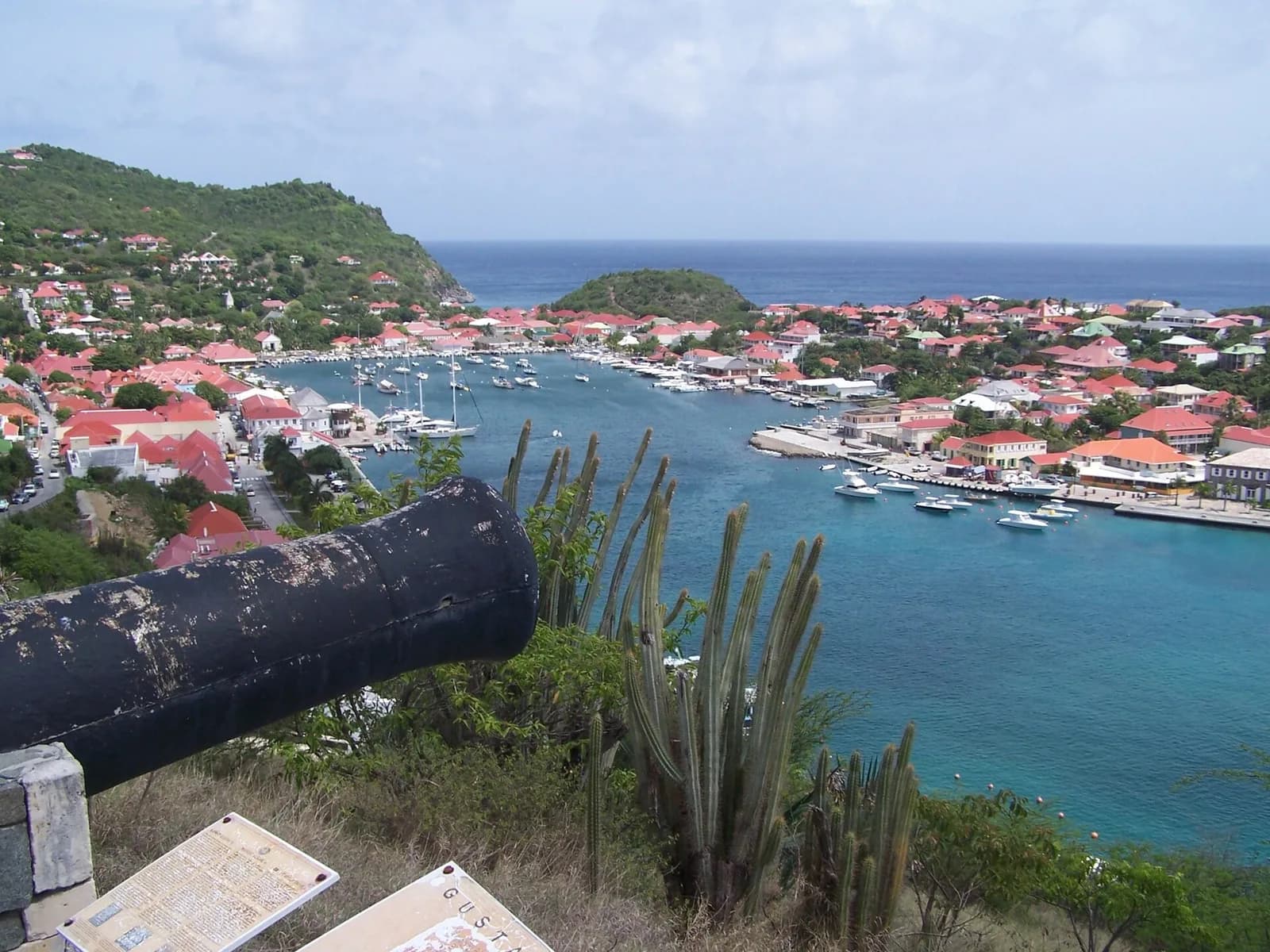 Yachts in Gustavia inner harbor with the red-roofed waterfront